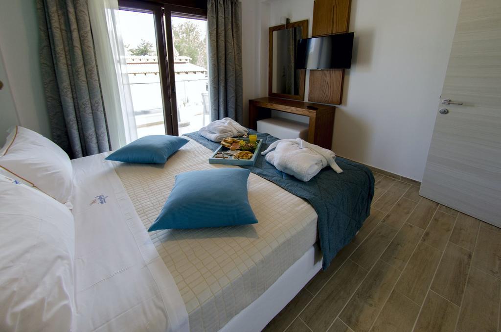 Hatzoudis Luxury Suites Chrysi Ammoudia Bagian luar foto